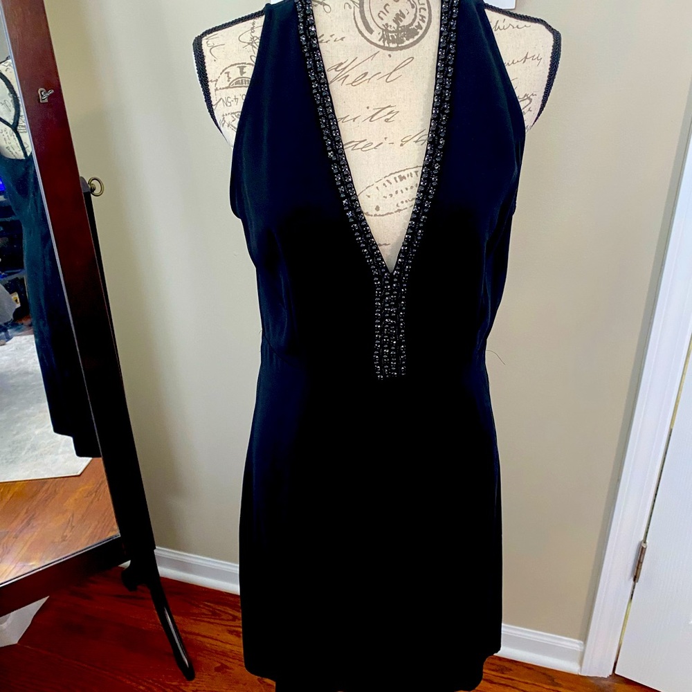 Woman deep v neck dress. New with tag